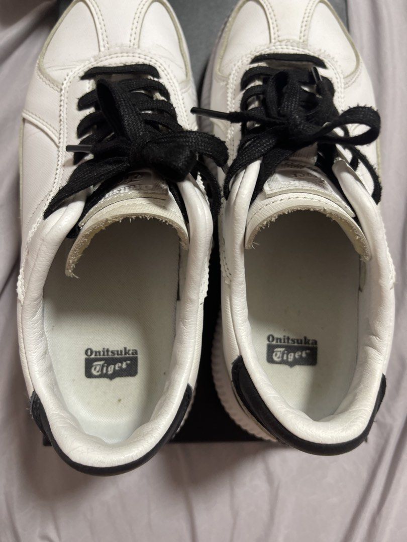 DELECITY Onitsuka Tiger Sneakers - White (Category: Sneakers) located in Singapore. Submitted by jiiajiang (Listing ID 1432916136, Image 3). Description: - White Onitsuka Tiger sneakers - Black laces - Platform sole - Perfect for casual wear Lightly worn Size 39.5 Free collection at toapayoh dm for info Meet up at nex Serangoon or tpy central +$ Original price $300 plus Selling for $140 Fast deal $120 Open for nego.