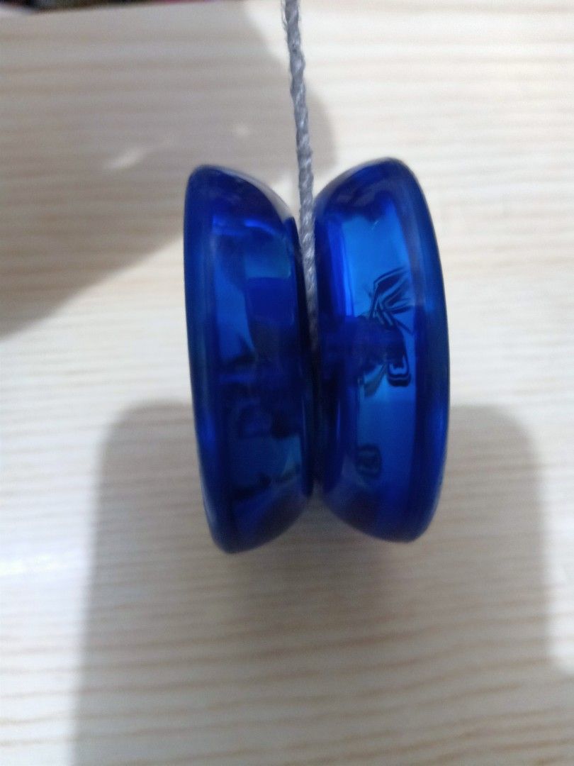 Duncan Reflex Yo-yo (Category: Action & Battle Toys) located in Las Pinas. Submitted by the_recycle_shop (Listing ID 1432927038, Image 3). Description: - Duncan Reflex yo-yo - Blue translucent body with orange accents - Features "Reflex" logo and Duncan brand name - String attached and ready to use.