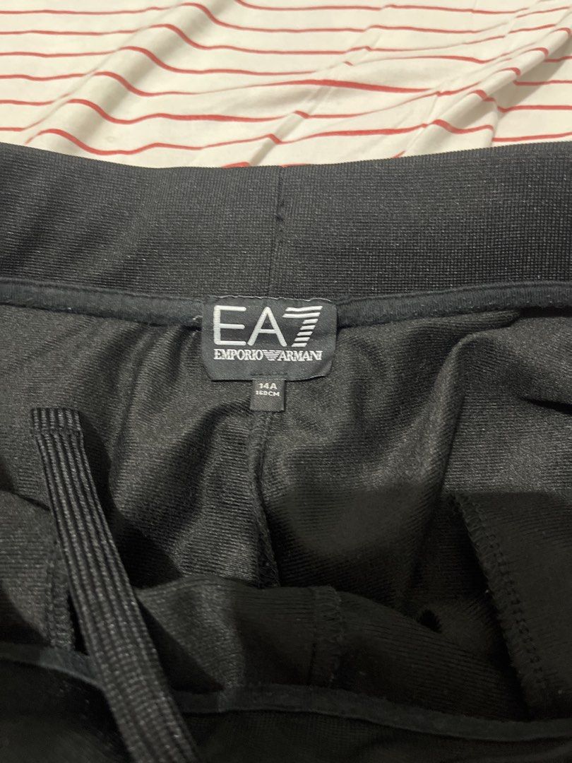 EA7 Emporio Armani Tracksuit Set (Category: Sets & Coordinates) located in Batangas. Submitted by cahrule (Listing ID 1432934394, Image 2). Description: - Black EA7 Emporio Armani tracksuit set - Includes jacket and pants - Size: 14A - Jacket size tag: 160cm - Jacket features full zip and EA7 logo - Pants feature drawstring waist and EA7 logo Just 4,999 TERNO.