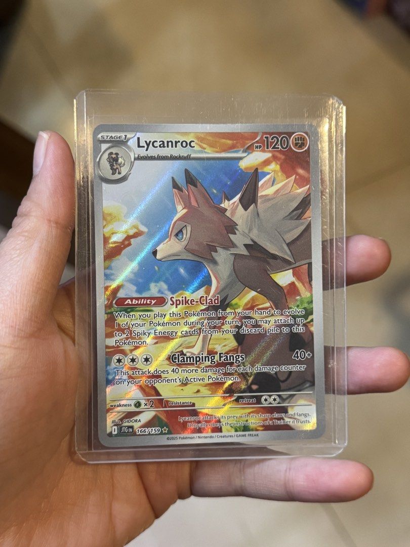 [ENGLISH VERSION] Prismatic Evolutions Lycanroc IR 166/159 - Authentic Pokemon TCG (Category: Raw Singles) located in Davao. Submitted by capsuleplanetph (Listing ID 1432944440, Image 2). Description: The art on this Lycanroc is insane! 🔥 Part of the brand new Prismatic Evolutions set, this Illustration Rare captures Lycanroc in its signature fierce style. That sunset lighting in the background? 10/10. 🐺 Card Details: • Set: Prismatic Evolution