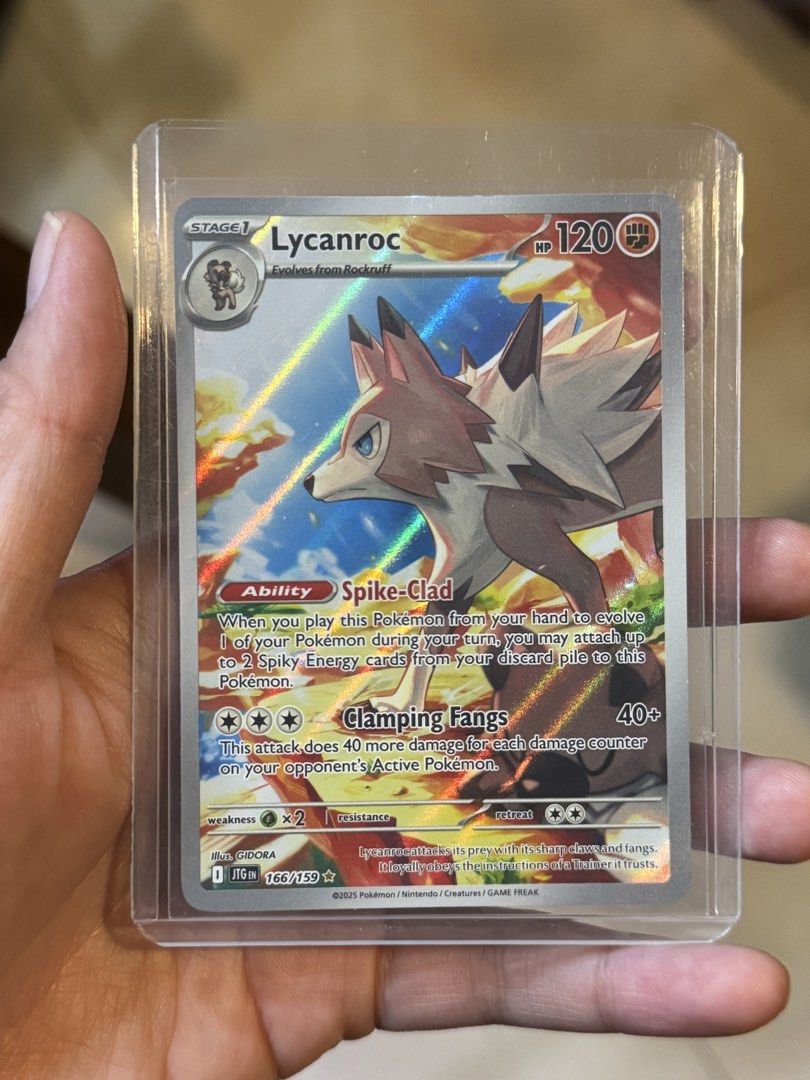 [ENGLISH VERSION] Prismatic Evolutions Lycanroc IR 166/159 - Authentic Pokemon TCG (Category: Raw Singles) located in Davao. Submitted by capsuleplanetph (Listing ID 1432944440, Image 1). Description: The art on this Lycanroc is insane! 🔥 Part of the brand new Prismatic Evolutions set, this Illustration Rare captures Lycanroc in its signature fierce style. That sunset lighting in the background? 10/10. 🐺 Card Details: • Set: Prismatic Evolution