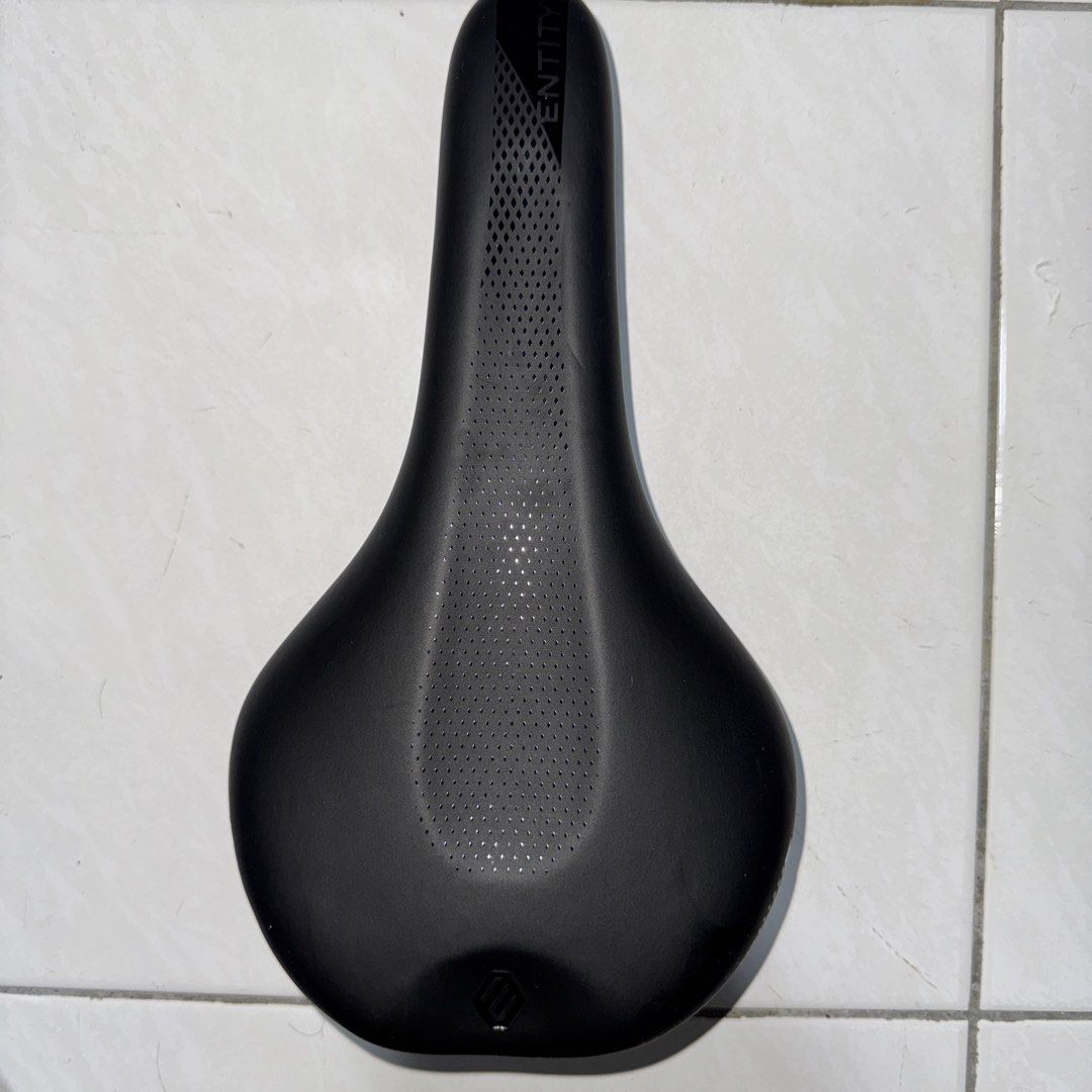 Entity Bike Saddle - Black (Category: Parts & Accessories) located in Singapore. Submitted by catorlando (Listing ID 1432833371, Image 1). Description: - Black Entity bike saddle - Comfortable design - Features a central ventilation channel - Perfect upgrade for your bike!.