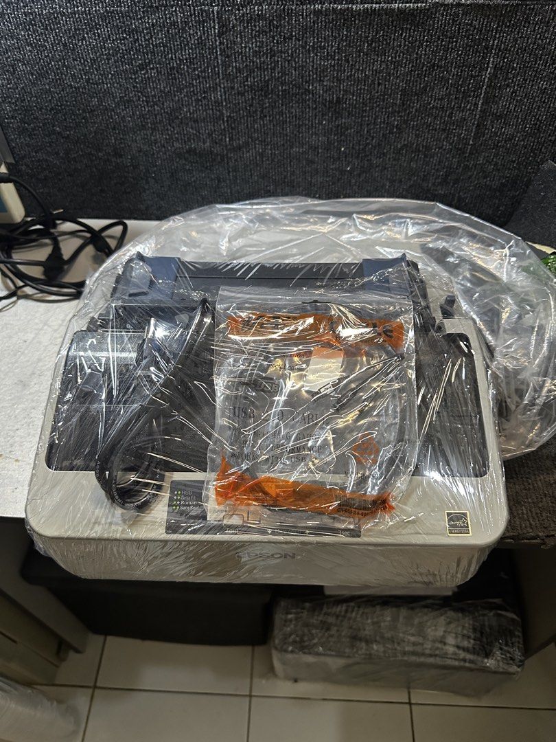 Epson LX-310 Dot Matrix Printer (Category: Printers, Scanners & Copiers) located in Makati City. Submitted by jtechs (Listing ID 1432897470, Image 2). Description: - Epson LX-310 dot matrix printer - secondhand like new complete accesories with top cover paper cutter and paper guide with box usb cord power cord without ribbon in good running condition.