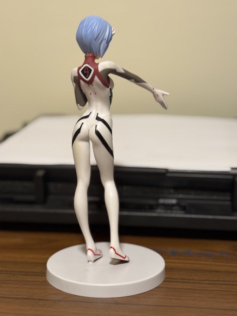 Evangelion - Rei Ayanami (Standard Plugsuit) Figure (Category: Figurines & Statues) located in Baguio. Submitted by swift_treasure.mart (Listing ID 1432935153, Image 2). Description: Evangelion - Rei Ayanami (Standard Plugsuit) Figure Item Details: • Brand/Character: SEGA / Evangelion (Rei Ayanami) • Specs: Standard white plugsuit variant with a round white base. Official SEGA marked prize figure. • Condition: Surplus/Loose. Pre-loved but in exce