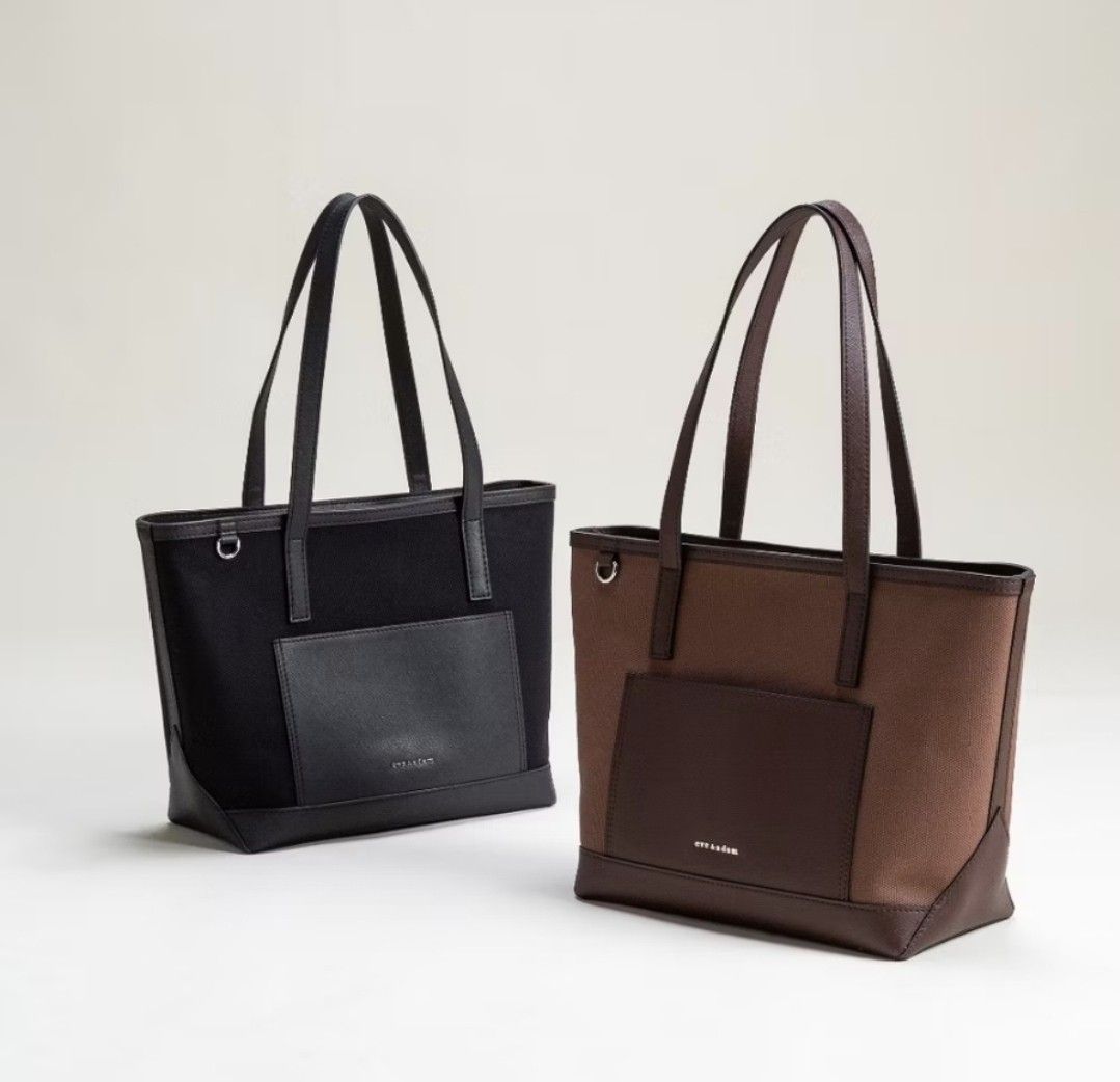 Eve and Adam Isla Tote Bag (Category: Tote Bags) located in Manila. Submitted by biabits (Listing ID 1432876793, Image 2). Description: - Stylish eve & Adam tote bag - Sleek design with front pocket - Spacious interior - Sturdy handles - Interior pockets for organization - Zipper closure - Available in black Used once. RFS: Too big for my liking :) message me for lp :) retails for 1,950 with card & tote bag.