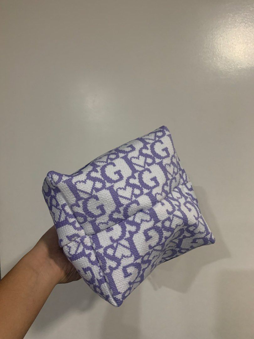 Explore I SG Handbag (Category: Tote Bags) located in Quezon City. Submitted by 47thclothing (Listing ID 1432914680, Image 3). Description: - Unique bucket bag design - Features "I SG" letters and heart patterns - Color scheme: White and purple - Handle accents: Pink and purple - Includes "Explore" tag.
