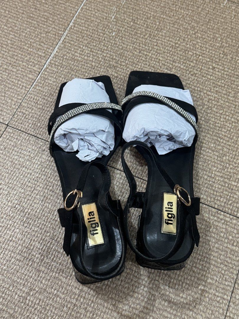 Figlia Black Sandals with Rhinestones (Category: Flats & Sandals) located in Caloocan City. Submitted by boneezytates (Listing ID 1432850800, Image 2). Description: DECLUTTERING!! - Figlia black sandals - Used thrice only for events - Square toe design - Block heels: 2 inches - Rhinestone-adorned strap - Ankle strap with buckle closure - Includes original box and dust bag each shoe - Issue: May konting leather sa loob ng strap na nagbakbak but lo