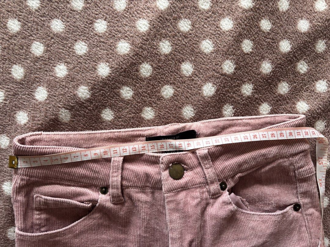 Forever 21 Corduroy Pants XS (Category: Other Bottoms) located in Cebu City. Submitted by conductdisorder (Listing ID 1432870352, Image 3). Description: These Forever 21 corduroy pants are a lovely dusty rose color. They are size XS. The waist measures approximately 28 inches, and the inseam is about 32 inches. The pants have a button and zipper closure, and feature pockets in the front and back..