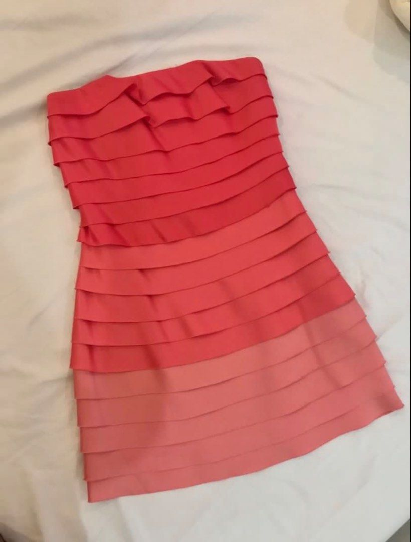 Forever 21 Summer party dress (Category: Dresses) located in Manila. Submitted by harlem55 (Listing ID 1432870040, Image 1). Description: -Satin fabric - Strapless dress - Coral and pink layered ruffle design - Fitted silhouette - Size 2 - Zipper closure - Fabric has a slight sheen - Perfect for special occasions or a night out.