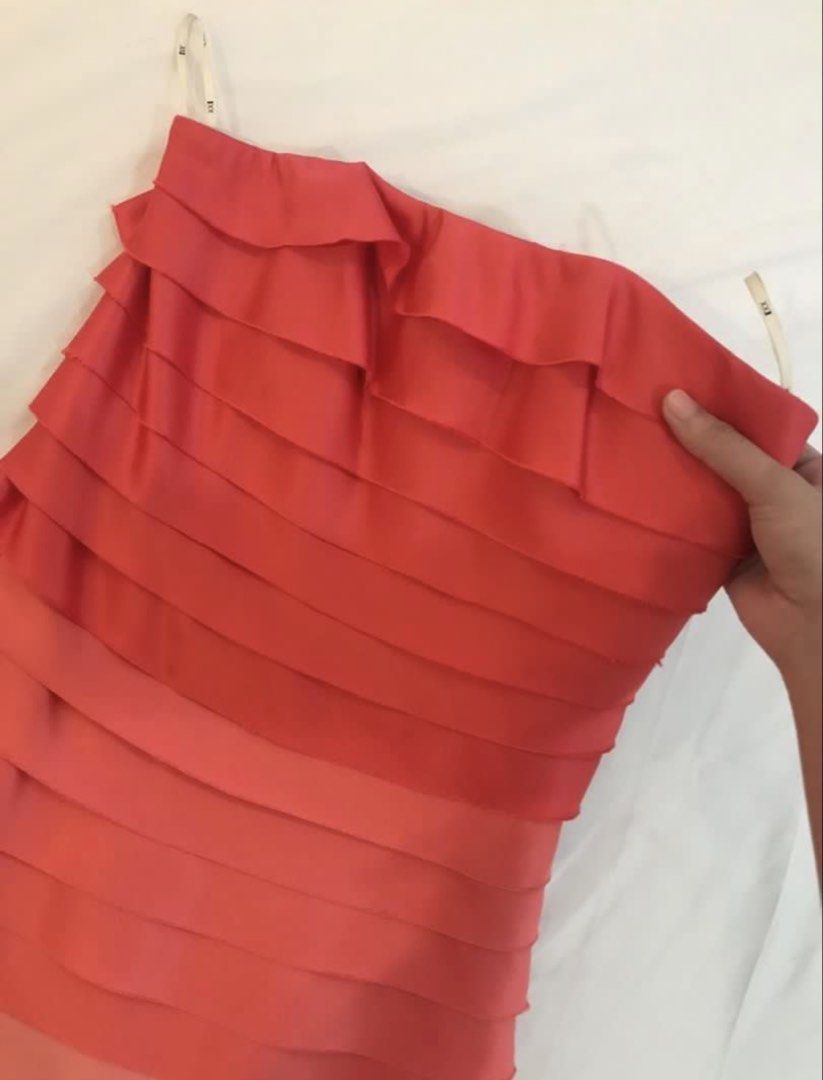 Forever 21 Summer party dress (Category: Dresses) located in Manila. Submitted by harlem55 (Listing ID 1432870040, Image 2). Description: -Satin fabric - Strapless dress - Coral and pink layered ruffle design - Fitted silhouette - Size 2 - Zipper closure - Fabric has a slight sheen - Perfect for special occasions or a night out.