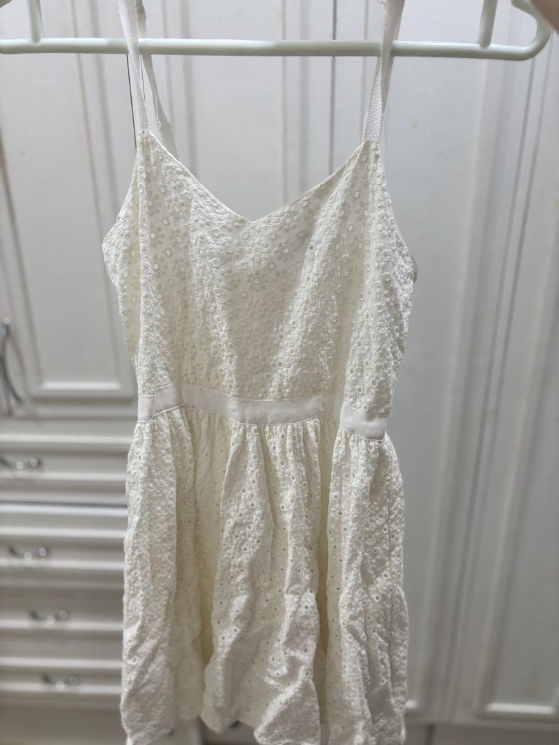 Forever 21 White Eyelet Dress (Category: Dresses) located in Manila. Submitted by harlem55 (Listing ID 1432868678, Image 2). Description: Used but not abused :)) perfect for the summer white eyelet sundress - Forever 21 white eyelet dress - Size: S - Features: - V-neckline - Adjustable straps - Fitted bodice - Flared skirt - Back zipper closure - Perfect for casual wear or summer events.