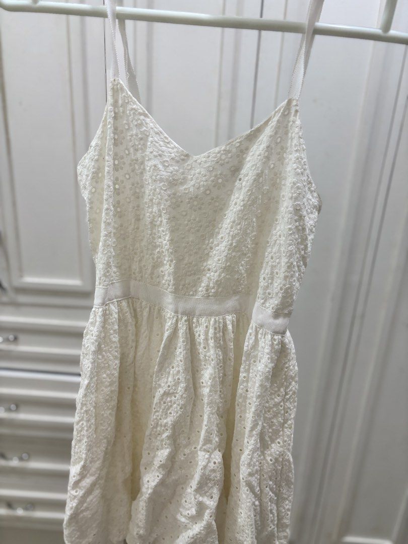 Forever 21 White Eyelet Dress (Category: Dresses) located in Manila. Submitted by harlem55 (Listing ID 1432868678, Image 3). Description: Used but not abused :)) perfect for the summer white eyelet sundress - Forever 21 white eyelet dress - Size: S - Features: - V-neckline - Adjustable straps - Fitted bodice - Flared skirt - Back zipper closure - Perfect for casual wear or summer events.