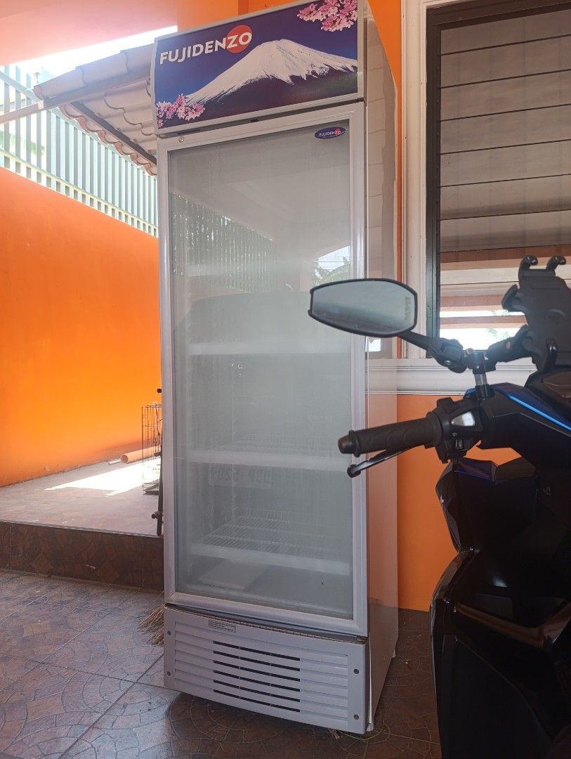 Fujidenzo Commercial Refrigerator (Category: Refrigerators and Freezers) located in Manila. Submitted by delatorrek63931 (Listing ID 1432922775, Image 2). Description: - Fujidenzo commercial refrigerator - Glass door for easy viewing - Multiple shelves for storage - White exterior - Bottom vent - Brand logo visible - In good working condition.