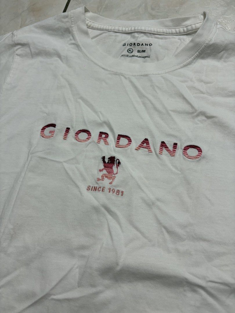 Giordano White T-shirt (Category: Tshirts & Polo Shirts ) located in Manila. Submitted by strangeee (Listing ID 1432974622, Image 3). Description: Giordano White Shirt with Logo Length: 25.5 Shoulders: 15.5 Sleeves: 8 Chest: 19 Size on tag: XL (slimfit) fits: S-M - Only used once RFS: Decluttering personal items from my closet, not thrifted. .