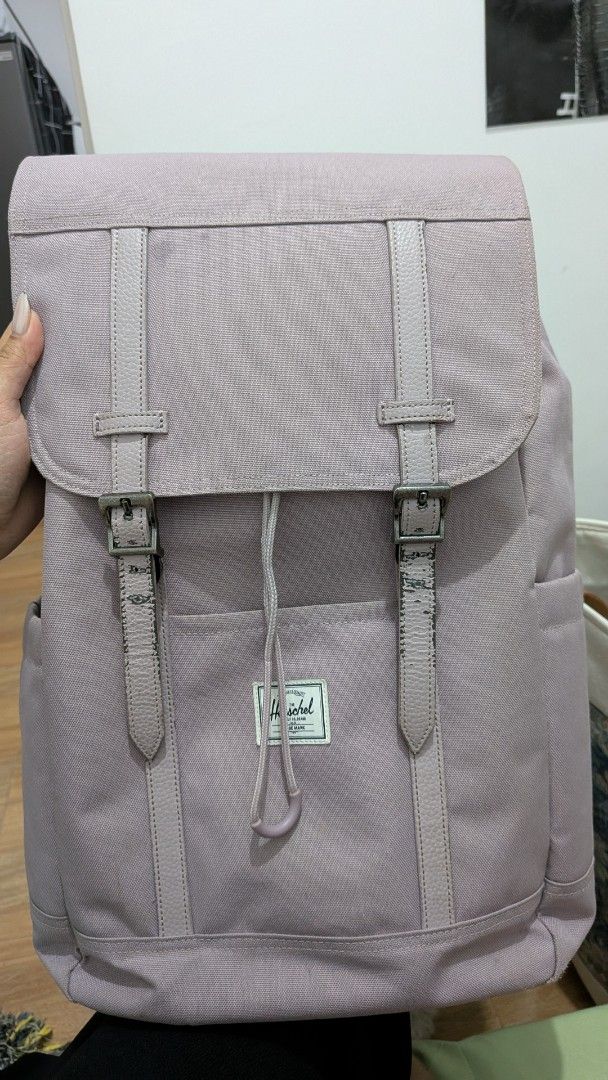 Herschel Retreat Backpack Ash Rose Us 23L (Category: Backpacks) located in Taguig. Submitted by xllmpne (Listing ID 1432942079, Image 1). Description: Selling my Herschel Retreat Backpack for ₱4,000 (negotiable). Used only for travel. Needs cleaning and has peeling on the strap leather (see photos). Still in good condition. With original receipt and lifetime warranty card. RFS: Switching to a duffle bag for future travels. 📍BGC, Taguig (shipping