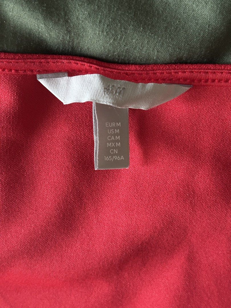 H&M Red Long Sleeve Top - Size M (Category: Blouses) located in Mandaluyong City. Submitted by bei_g (Listing ID 1432859506, Image 3). Description: - H&M top - Vibrant red color - Heart neckline - Long sleeves - Size: M - Versatile for various outfits.