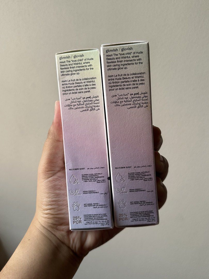 Huda Beauty Glowish MultiDew Foundation (Category: Makeup) located in Quezon City. Submitted by aebb__ (Listing ID 1432845347, Image 3). Description: - Huda Beauty Glowish MultiDew Foundation - Available Shades: 10 Deep Tan and 11 Deep - Size: 40 mL / 1.35 fl oz - Vegan-friendly - Cruelty-free (not tested on animals) - Packaging made with 25% PCR - swatched only not my shade.