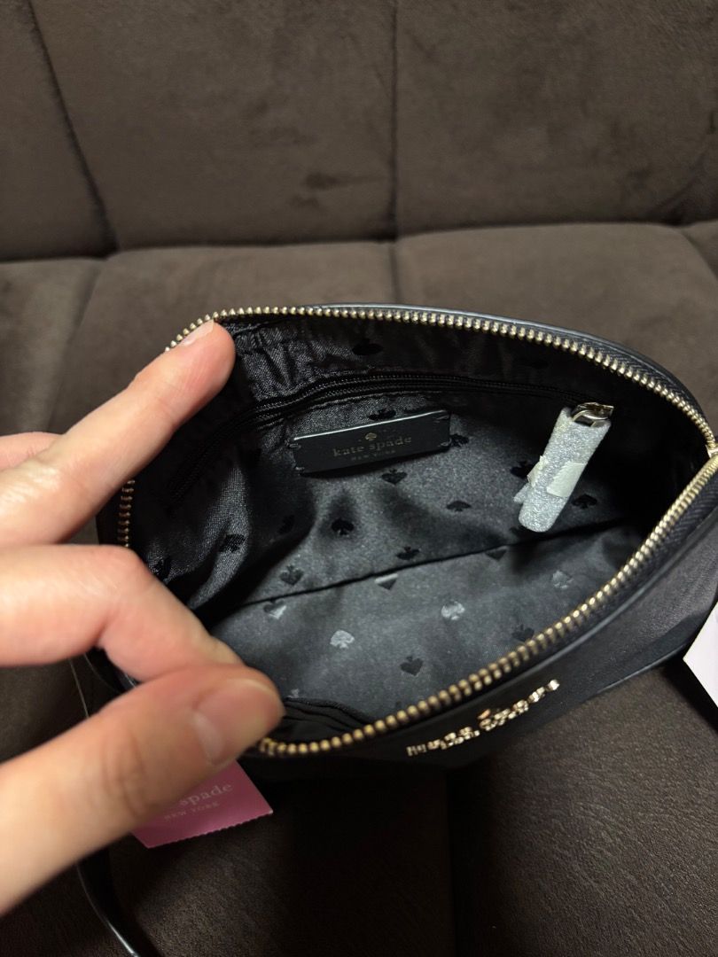 Kate Spade Tinsel Small Dome Crossbody (Category: Cross-body Bags) located in Caloocan City. Submitted by estjustine (Listing ID 1432852105, Image 3). Description: * measurements: 8" W x 5.4" H x 2.5" D * mini crossbody bag * never been used, with tags still on * new, perfect condition * limited edition glitter fabric design with saffiano pvc trim * guaranteed authentic from the US.