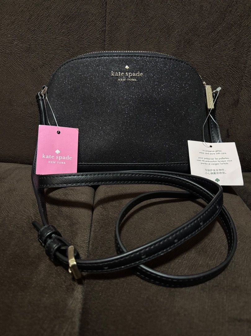 Kate Spade Tinsel Small Dome Crossbody (Category: Cross-body Bags) located in Caloocan City. Submitted by estjustine (Listing ID 1432852105, Image 1). Description: * measurements: 8" W x 5.4" H x 2.5" D * mini crossbody bag * never been used, with tags still on * new, perfect condition * limited edition glitter fabric design with saffiano pvc trim * guaranteed authentic from the US.