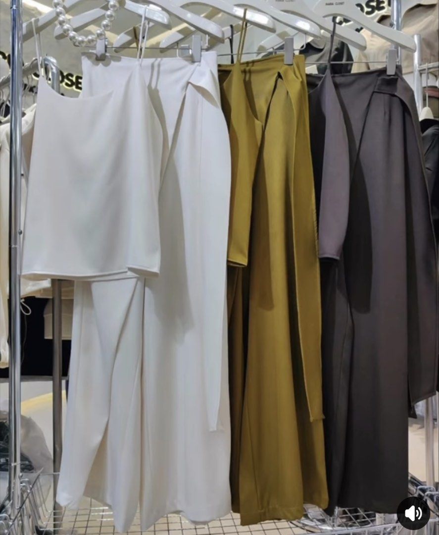 Korean Satin Cami Top and Wrap Pants Set (Category: Sets or Coordinates) located in Manila. Submitted by kspassion (Listing ID 1432803470, Image 2). Description: - Satin cami top and wrap pants set - Features spaghetti strap top and wide-leg pants - Wrap-around tie detail - Available colors: cream, olive green, dark brown - Great for casual and evening wear Free size fits up to xl Waist 24-32” garterized waist.