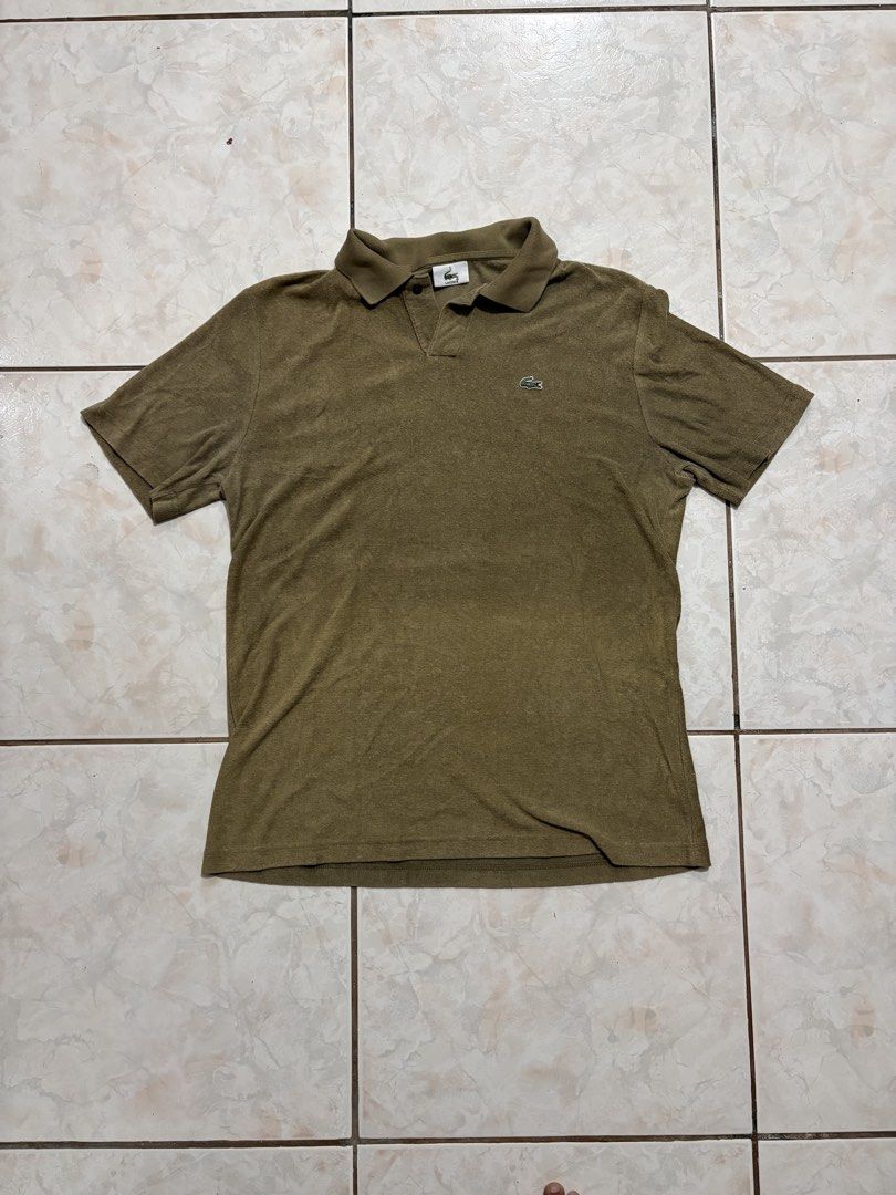 Lacoste Textured Brown Polo Shirt (Category: Tshirts & Polo Shirts ) located in Manila. Submitted by strangeee (Listing ID 1432973731, Image 1). Description: Lacoste Textured Brown Polo Shirt Length: 26.5 Shoulders: 17.5 Sleeves: 9 Chest: 20.5 Size: M Can fit: S-M Issue: slight discoloration lower part (not noticeable) RFS: Decluttering personal items from my closet, not thrifted. .