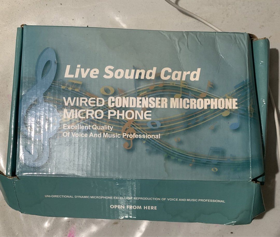 Live Sound Card, Wired Condenser Microphone (Category: Portable Audio Accessories) located in General Trias. Submitted by sofiethrifts (Listing ID 1432808037, Image 1). Description: - Never nagamit - Medyo lumambot yung labas ng box kasi na-stuck lang sa kwarto.