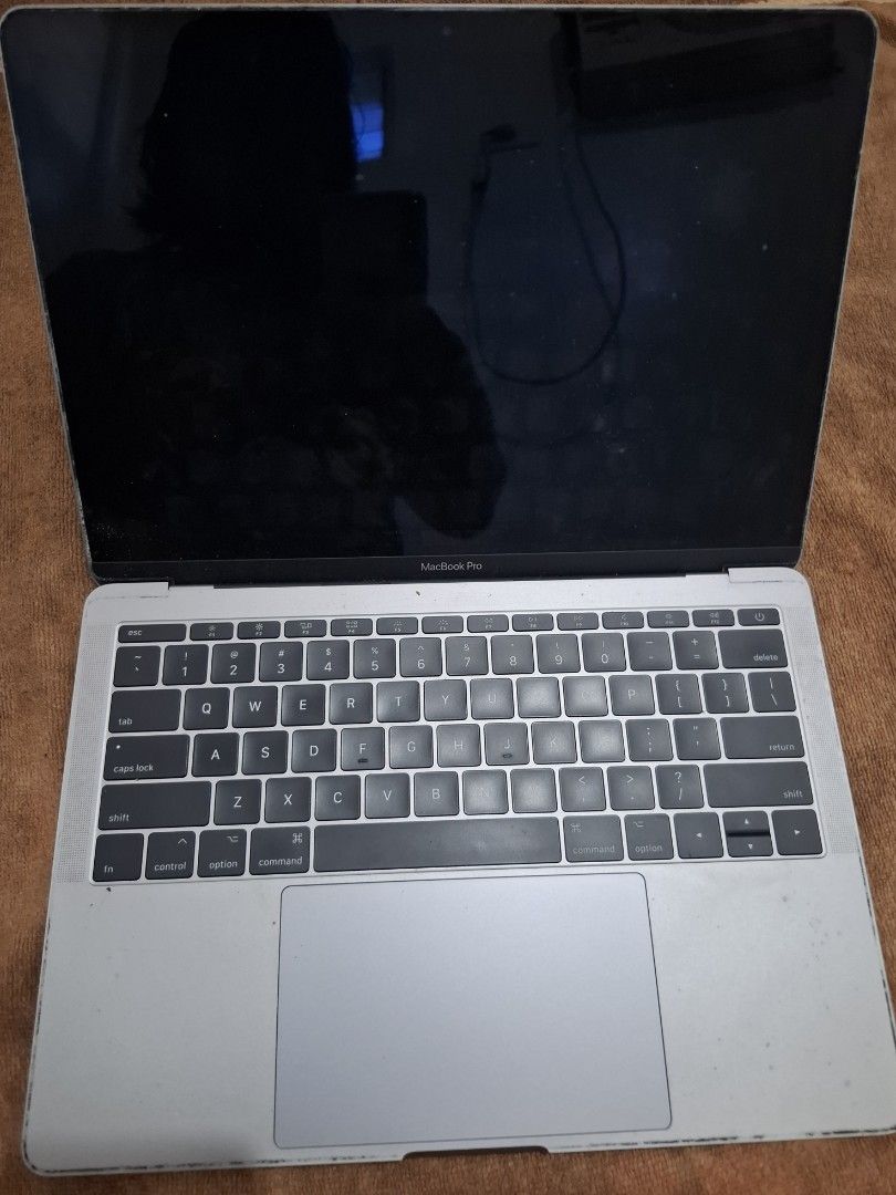 MacBook Pro 13-inch Retina (Model A1708, 2017) - Screen Damaged (Category: Laptops & Notebooks) located in Surigao. Submitted by pdrplj (Listing ID 1432988774, Image 3). Description: Selling a MacBook Pro 13-inch (Mid-2017, No Touch Bar) with a defective screen. The screen cracked and has vertical lines (see photos). However, the logic board is 100% functional. This is an ideal unit for someone who wants to use it as a "Headless Mac" (desktop mod