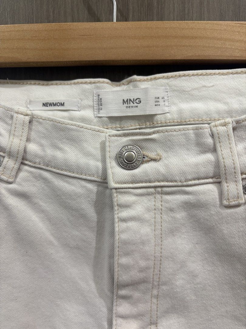 Mango New Mom Jeans (Category: Jeans) located in Manila. Submitted by dkarchives (Listing ID 1432920421, Image 3). Description: - White Mango New Mom jeans - Fit: Straight leg cut, but unlike the usual mom jeans the bottom is kinda narrow. - Size: 40 (too big on me now!).