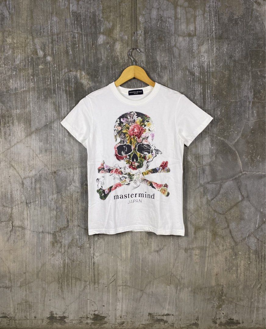 Mastermind Japan Floral Skull Graphic Tee (Category: Shirts) located in Roxas City. Submitted by wholelotta999 (Listing ID 1432806605, Image 1). Description: - Mastermind Japan t-shirt - Features a floral skull graphic - Crew neck design - Short sleeves - Made of lightweight material - Brand logo on front.
