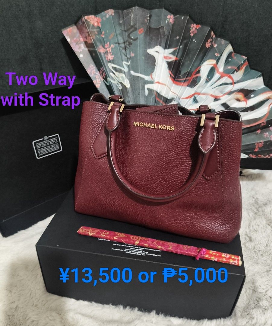 Michael Kors Two-Way Handbag (Category: Luxury Bags & Wallets) located in Lucena. Submitted by gwpsns_2026 (Listing ID 1432866559, Image 1). Description: - Michael Kors handbag in rich burgundy - Two-way design (strap and top handles) - Structured shape - Gold-tone hardware - Includes original box - Price: ¥13,500 / ₱5,000.