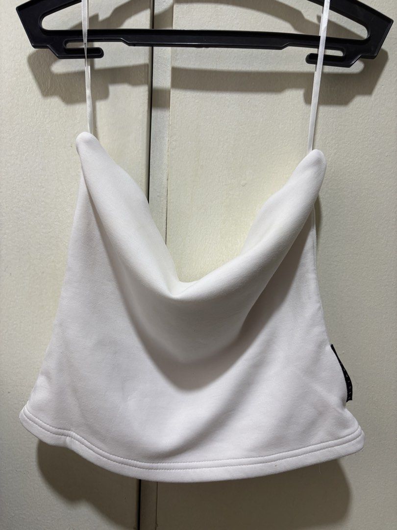 Missguided White Tube Top (Category: Sleeveless) located in Mandaue City. Submitted by gentlylovedcloset (Listing ID 1432860594, Image 1). Description: - White cowl neck top - Unique draped neckline - Fitted silhouette - Thin straps - Smooth, possibly stretchy fabric.