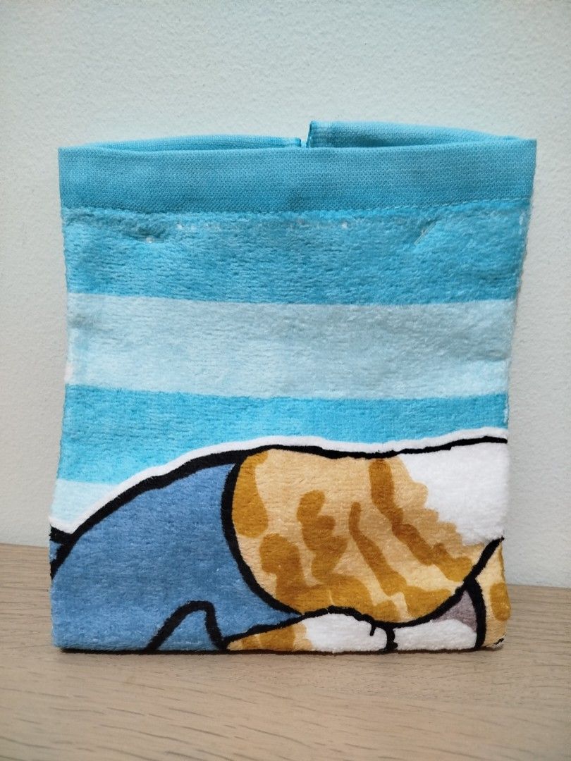 Mofusand Shark Cat Towel (Medium) (Category: Bedding & Towels) located in Quezon City. Submitted by luckycitrine (Listing ID 1432921217, Image 2). Description: - Features a cute cat in a shark costume - Blue and white striped background - Made of 100% cotton - Size: 34x76cm, can be used as bath towel if petite - Brand new with tag attached - Authentic Mofusand merch from Taiwan - 2 stocks left - Ships via Grab/Lalamove from Novaliches.