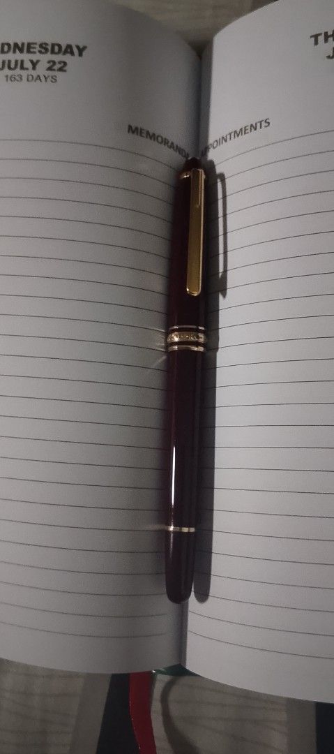 Montblanc Burgundy Pen (Category: Luxury Accessories) located in Quezon City. Submitted by expe888 (Listing ID 1432972083, Image 1). Description: - Burgundy Montblanc pen - Gold-colored accents - Sleek design - Perfect for everyday use - Great gift option.