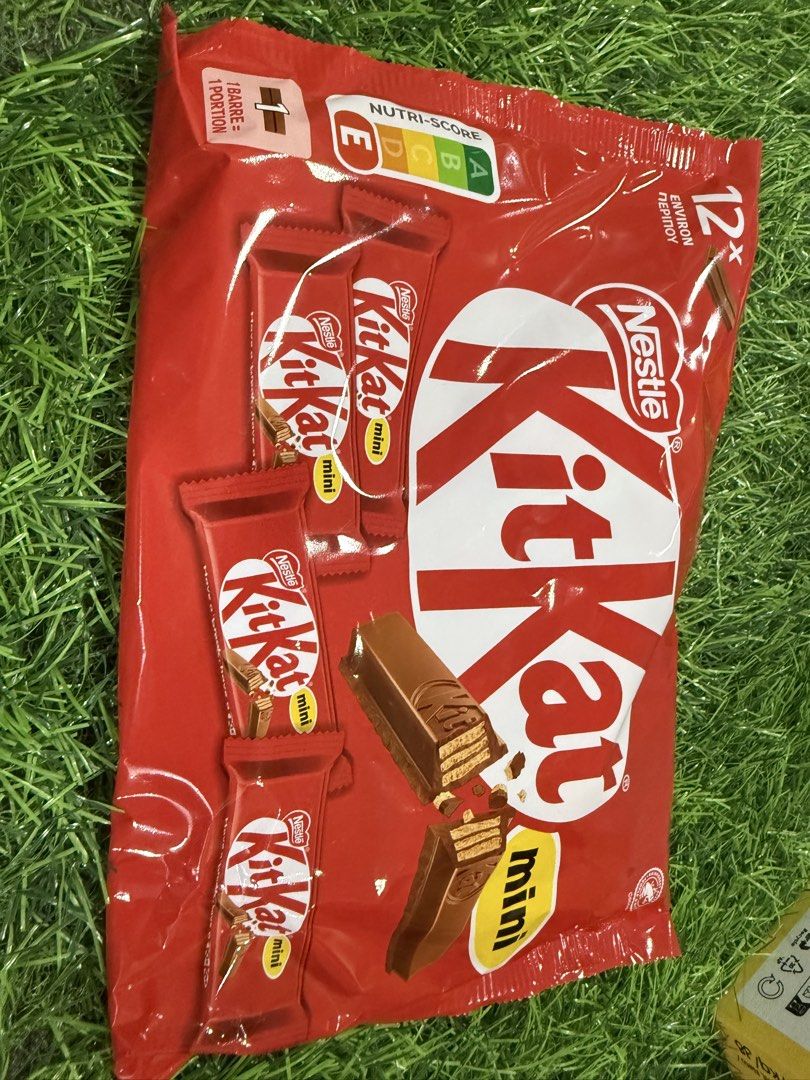 Nestle Kit Kat Mini 12-Pack (Category: Other Food & Drinks) located in Cavite. Submitted by aimscloset28 (Listing ID 1432876602, Image 2). Description: Enjoy a pack of Nestle Kit Kat Mini! Each pack contains 12 mini Kit Kat bars. Perfect for sharing or a quick treat. The packaging is red with the Kit Kat logo and a picture of the chocolate bar. The pack also has a Nutri-Score label..