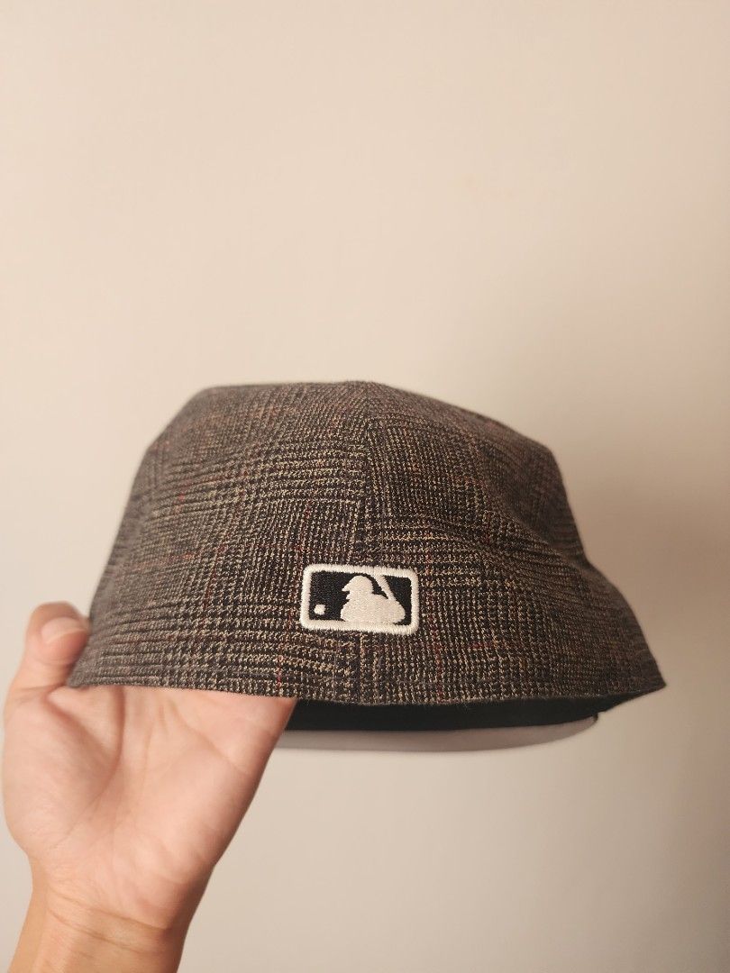 New Era LA Dodgers 59Fifty Plaid (Category: Caps & Hats) located in Santo Tomas. Submitted by mieu_declutters (Listing ID 1432890951, Image 3). Description: - Authentic - Bought in Malaysia - Features the LA Dodgers logo - Stylish plaid pattern on the crown - Classic black brim - Size: 7 1/8 - Includes New Era logo on the side and MLB logo at the back - Comes with a New Era tote bag.