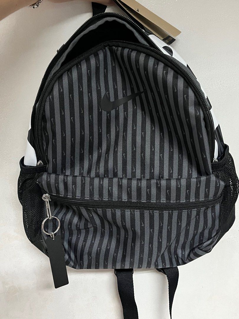 Nike Black Just Do it Backpack Bag (Category: Backpacks) located in Quezon City. Submitted by mkd_08 (Listing ID 1432852631, Image 1). Description: Brand new bought in US capacity: 672 cubic inches size: small for kids can do meet up around UST or taft area price negotiable.