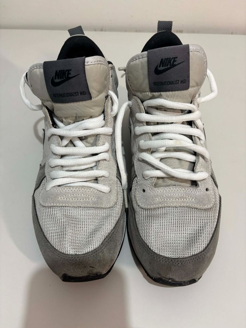Nike Internationalist Mid “Wolf Grey” (Category: Sneakers) located in Lipa City. Submitted by gerardcala51660 (Listing ID 1432830472, Image 3). Description: 👟 Nike Internationalist Mid “Wolf Grey” Size: US 9 / EUR 42.5 / 27 cm Color: Wolf Grey / Black / White Condition: Thrifted / Preloved Issue: May konting signs of reglue sa toe cap, still very wearable ⚠️ Check photos before buying 💸 Price: ₱799 — negotiable.