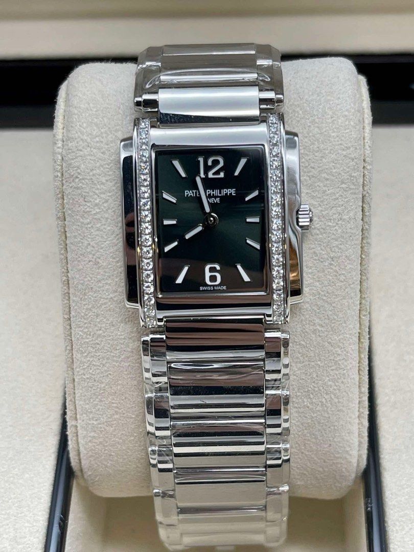 Patek Philippe Twenty~4 Automatic Watch (Category: Luxury Watches) located in Manila. Submitted by watchesbyjamesdy (Listing ID 1432894494, Image 1). Description: - Patek Philippe Twenty~4 Automatic watch - Rectangular dark green dial - Diamond accents - Stainless steel bracelet with folding clasp - Date display at 6 o'clock - Swiss Made.
