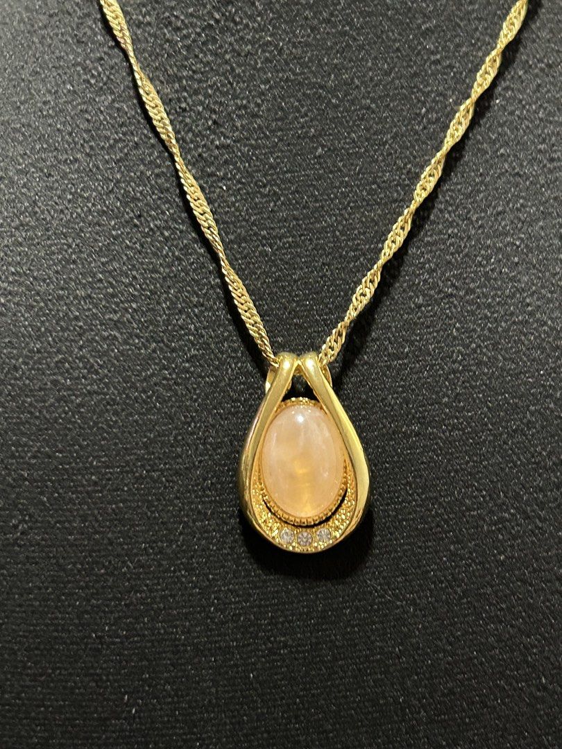 peach moonstone vintage-style teardrop pendant (Category: Necklaces) located in Angeles City. Submitted by zyeplustradings (Listing ID 1432853710, Image 1). Description: vintage-style teardrop pendant peach moonstone The pendant is set in a polished yellow gold-plated or gold-filled frame, accented with small clear crystals or diamonds at the base. .