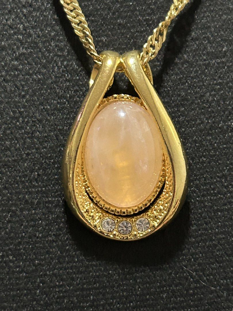 peach moonstone vintage-style teardrop pendant (Category: Necklaces) located in Angeles City. Submitted by zyeplustradings (Listing ID 1432853710, Image 3). Description: vintage-style teardrop pendant peach moonstone The pendant is set in a polished yellow gold-plated or gold-filled frame, accented with small clear crystals or diamonds at the base. .