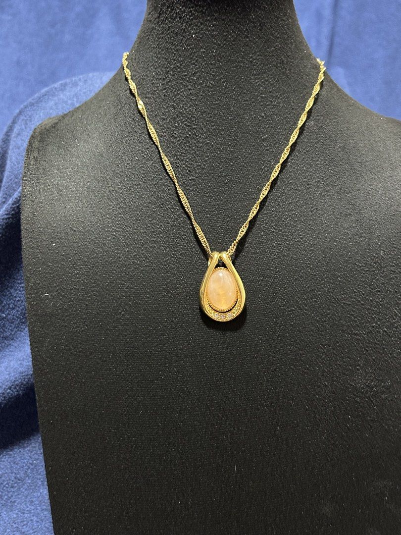 peach moonstone vintage-style teardrop pendant (Category: Necklaces) located in Angeles City. Submitted by zyeplustradings (Listing ID 1432853710, Image 2). Description: vintage-style teardrop pendant peach moonstone The pendant is set in a polished yellow gold-plated or gold-filled frame, accented with small clear crystals or diamonds at the base. .