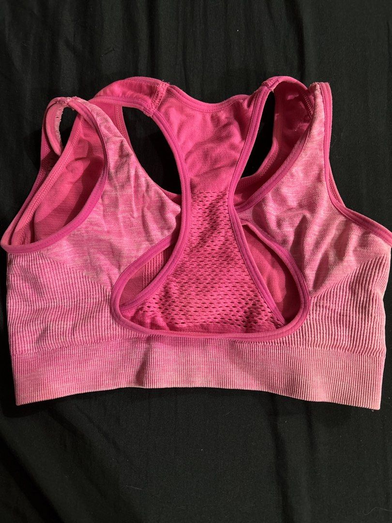 Pink Seamless Sports Bra (Category: Activewear) located in Batangas. Submitted by v.ukay (Listing ID 1432982629, Image 2). Description: - Pink sports bra - Racerback style - Ribbed band - Solid pink color with gradient effect - Ideal for athletic activities.