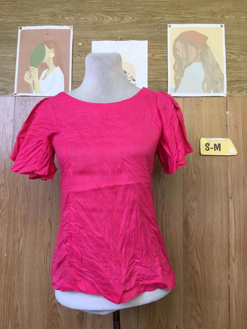 Pink Top with Puff Sleeves (Category: Blouses) located in Cabadbaran. Submitted by KsGoodFind (Listing ID 1432866637, Image 1). Description: - Pink top, size S-M - Round neckline - Short puff sleeves - Fitted silhouette with a flared waist - Textured fabric.