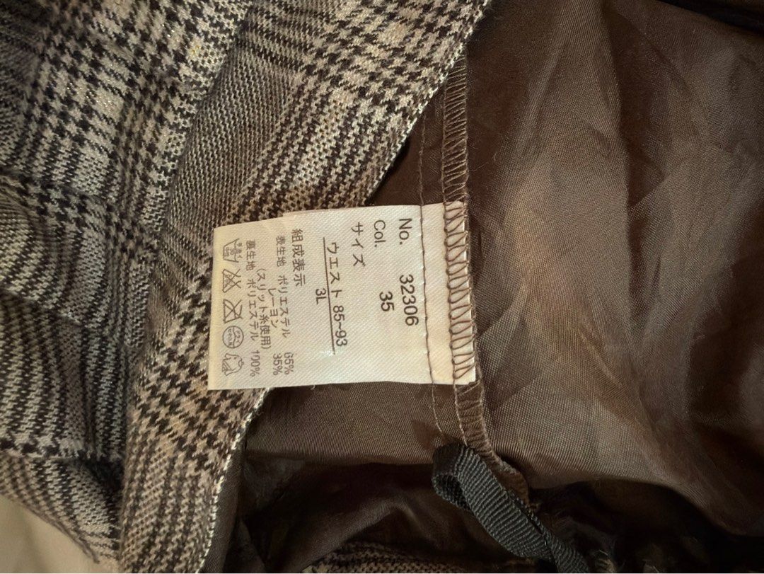 Plaid Pleated Skirt (34-38) (Category: Skirts) located in Urdaneta. Submitted by glamduck (Listing ID 1432874011, Image 2). Description: - Classic plaid pattern - Pleated design - Brown lining - Size: 3L (waist 85-93) - Material: Outer - 65% polyester, 35% rayon; Lining - 95% polyester, 5% rayon.