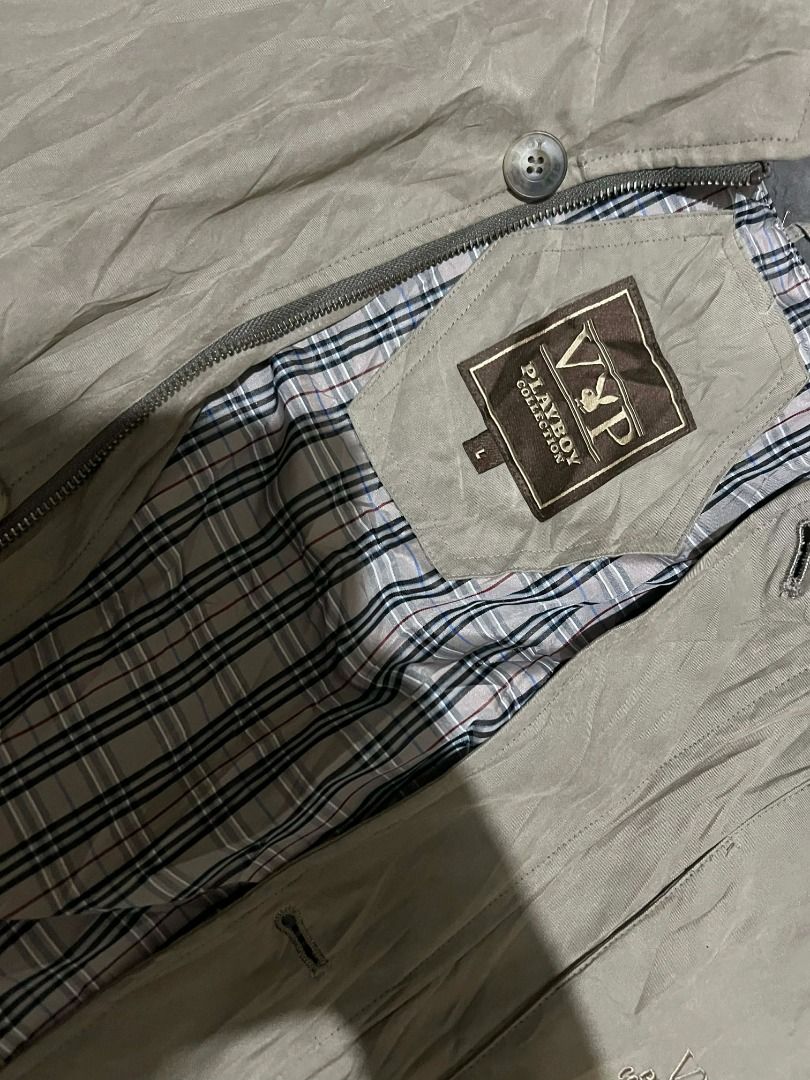 Playboy VIP Collection Jacket - Size L (Category: Coats, Jackets and Outerwear) located in Caloocan City. Submitted by meadowfindz (Listing ID 1432994410, Image 1). Description: - Playboy VIP Collection jacket - Size: L - Color: Beige exterior - Lining: Plaid pattern - Closure: Zipper - Pockets: Multiple, including a 'telephone pocket' - Branding: Playboy VIP Collection logo on zipper and interior label.