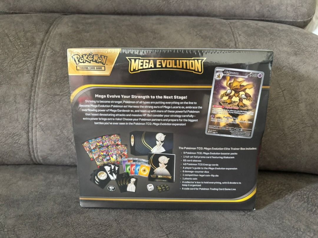 Pokémon TCG: Mega Evolution Elite Trainer Box (Category: Card Boxes & Cases) located in Kuala Lumpur. Submitted by carson_store (Listing ID 1432823708, Image 2). Description: Pokémon TCG: Mega Evolution Elite Trainer Box (Tear Condition) 9 Pokémon TCG: Mega Evolution booster packs 1 full-art foil promo card featuring Alakazam or Riolu 65 card sleeves 40 Pokémon TCG Energy cards A player’s guide to the Mega Evolution expansion 6 damage-counter dic