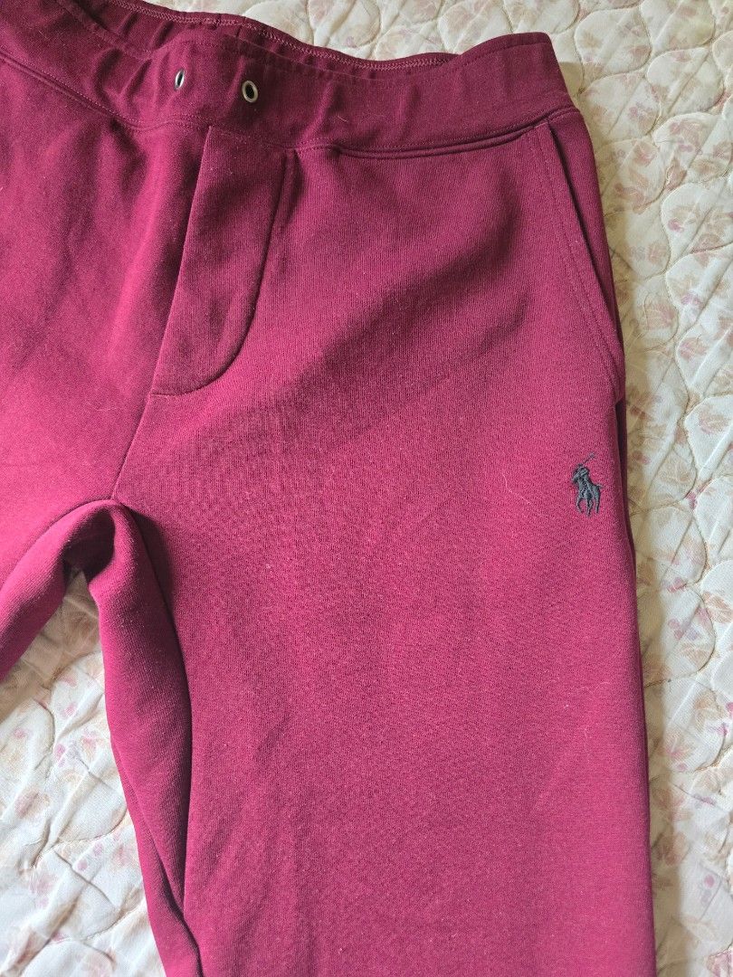 Polo Ralph Lauren Sweatpants - Maroon (Category: Joggers) located in Quezon City. Submitted by jb0516 (Listing ID 1432861888, Image 2). Description: - Polo Ralph Lauren sweatpants - Color: Maroon - Size: SP - Features: - Small logo on left leg - Back pocket - Button closure at waist - Cuffed ankles - Made in China - Material: Soft, comfortable fabric.