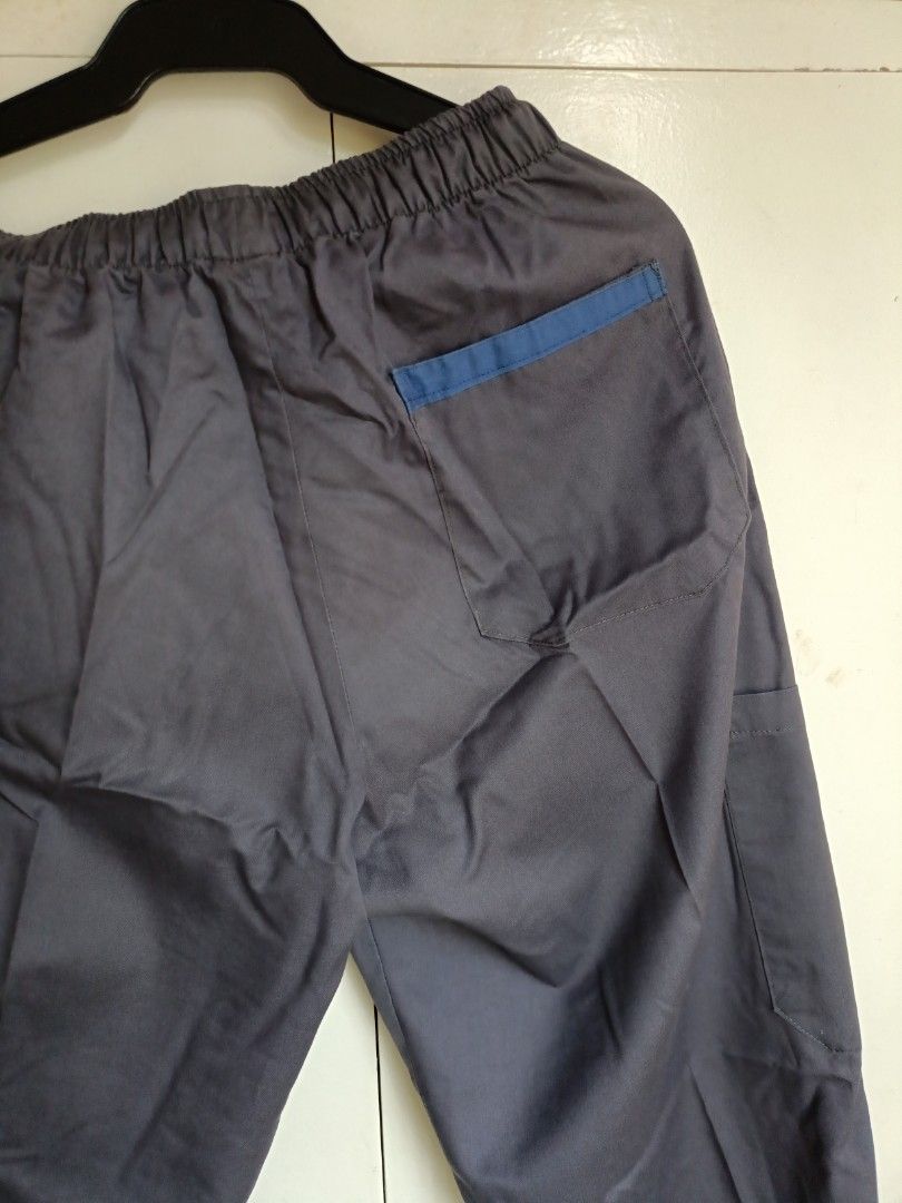 Scrub Pants (Category: Medical Supplies & Tools) located in Manila. Submitted by cjdominguez (Listing ID 1432796193, Image 3). Description: 5 pcs available 5 pockets (see photos) Color: Gray with blue lining on back pocket.