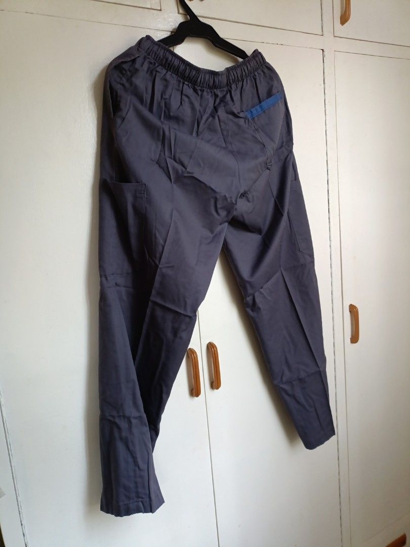 Scrub Pants (Category: Medical Supplies & Tools) located in Manila. Submitted by cjdominguez (Listing ID 1432796193, Image 2). Description: 5 pcs available 5 pockets (see photos) Color: Gray with blue lining on back pocket.