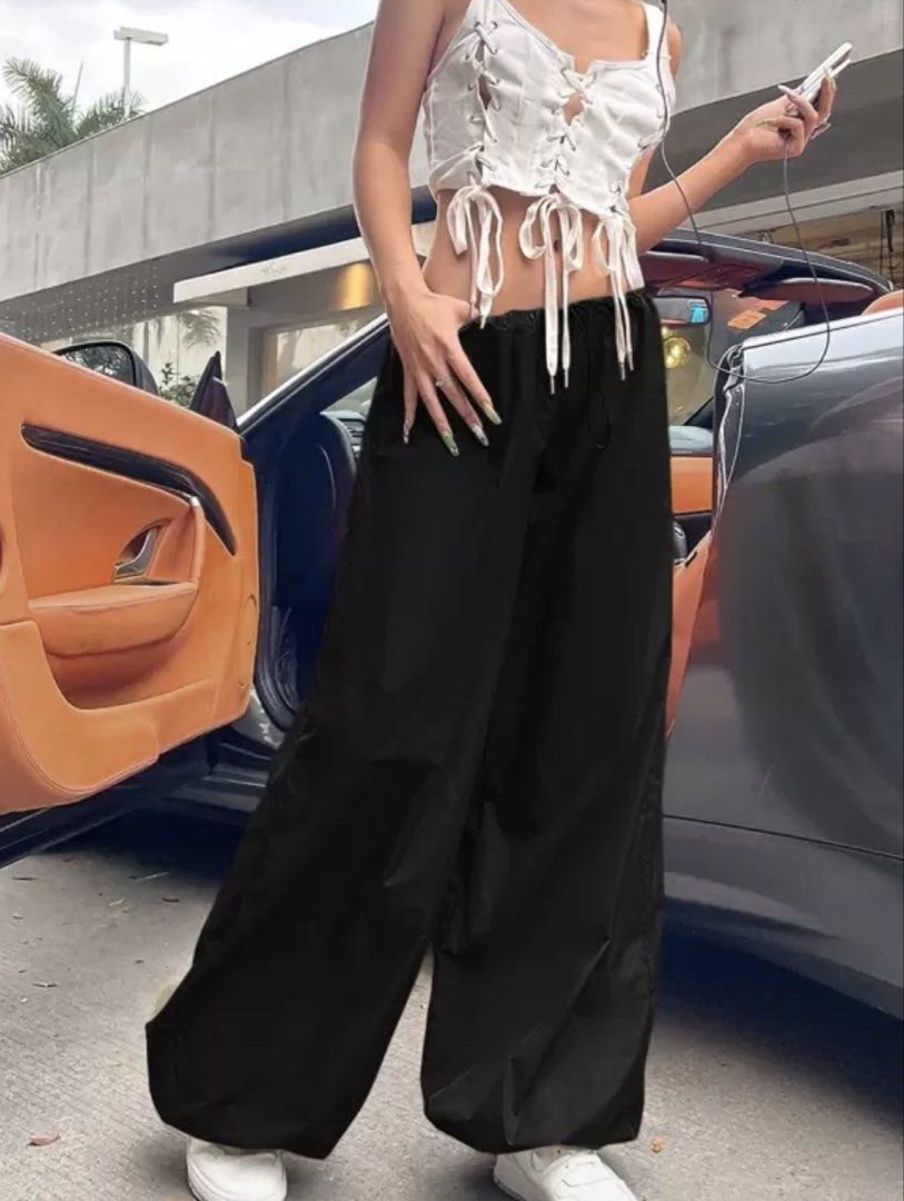 SHEIN Black Parachute Wide Leg Pants (Category: Other Bottoms) located in San Fernando. Submitted by myuhui (Listing ID 1432909349, Image 2). Description: letting go of these because they run big on me 🥲 great find if you’re between S-M or love oversized baggy fit Brand: SHEIN Color: Black Size: Small Style: Wide leg / parachute Waist: Elastic drawstring Condition: Like new (worn only once) 🏷️ shein icon parachute pants wide leg pants black pan